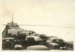 The LEONARD B. MILLER in the ice with a deck load of vehicles