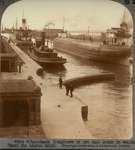 Whaleback freighters of ore and grain in canal, Sault Ste. Marie, Mich.