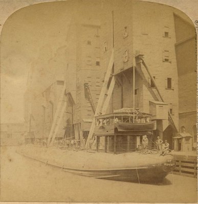 Loading the Great Whaleback Ship at the Famous Grain Elevators, Chicago