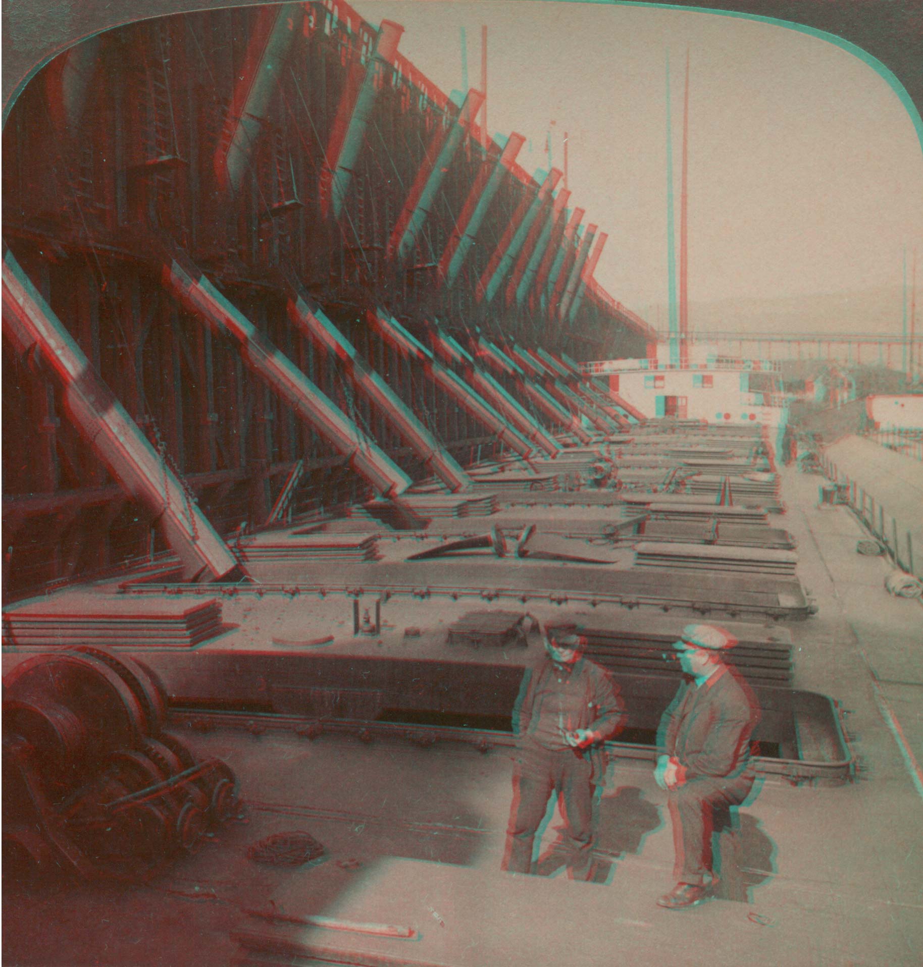 Aboard a Lake steamer loading with iron ore by chutes from gigantic docks, Duluth, Minn.