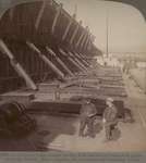 Aboard a Lake steamer loading with iron ore by chutes from gigantic docks, Duluth, Minn.