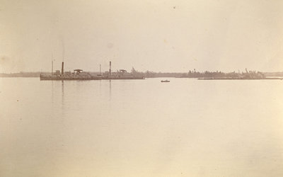 CHIEFTAIN and JOHN A. MACDONALD towing timber rafts on the Saint Lawrence River