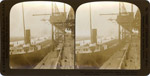 Unloading coal -- a modern lake steamer at Fort William, Ontario Canada