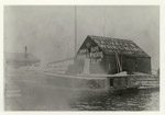 Donnelly's Salvage & Wrecking Co. shed and steam yacht