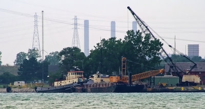 U.S. Army Corps of Engineers tugboat DEMOLEN with dredge and barge